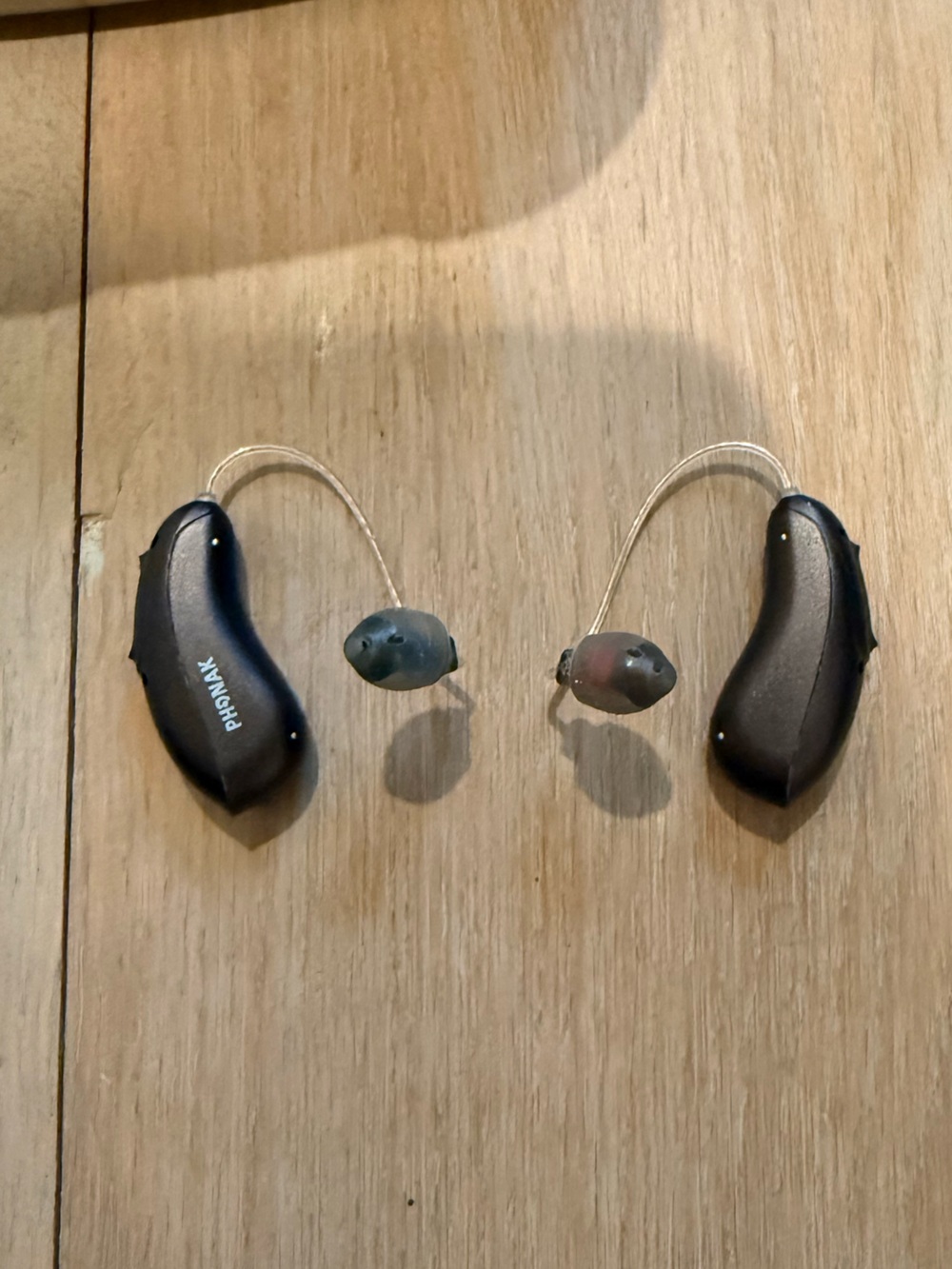 Black Behind-the-Ear Hearing Aids with Clear Tubing